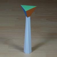 Paper model tetrahedron on pedestal